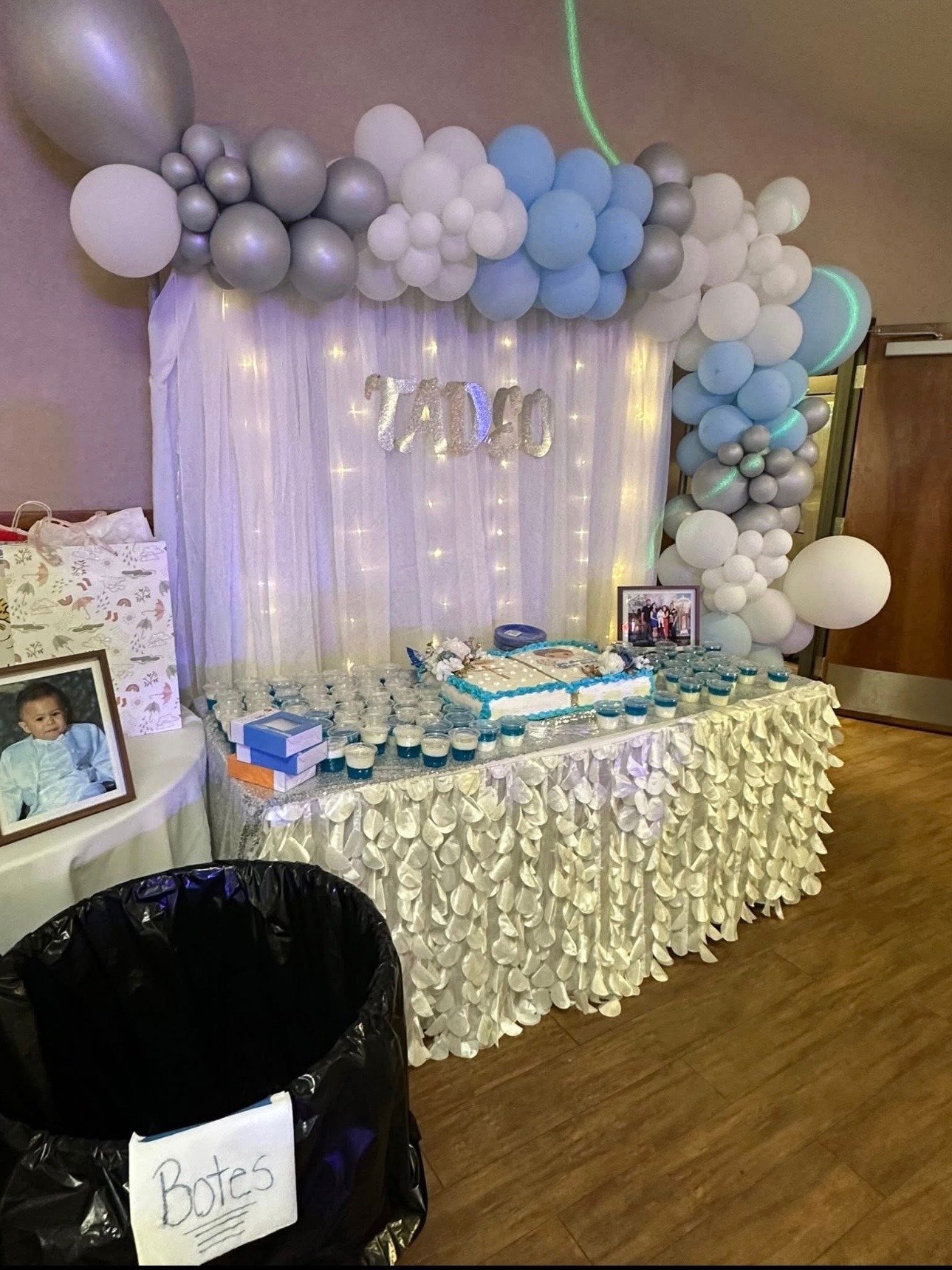 Tadeo baby shower balloon garland and dessert table