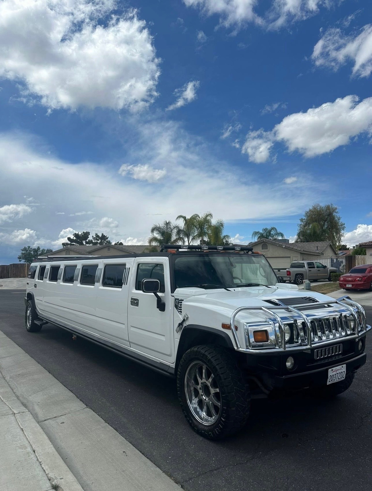 White stretch Hummer limousine